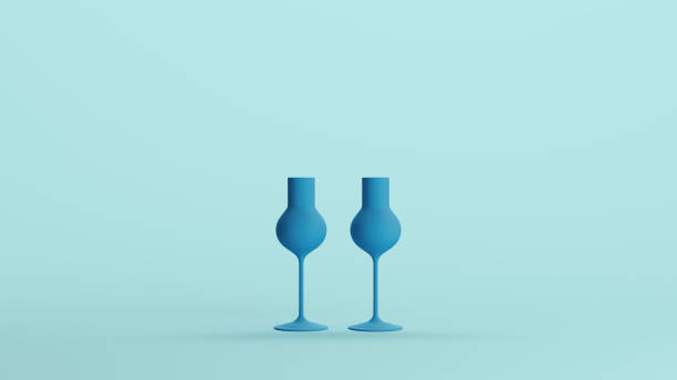 istock Blue liqueur glasses party soft tones pale background 2158154057