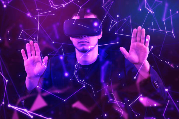 istock A Caucasian man wearing VR headset and immerses himself in a surreal,  Metaverse VR virtual reality game playing,  play metaverse virtual digital technology game control with VR goggle. 2158154371