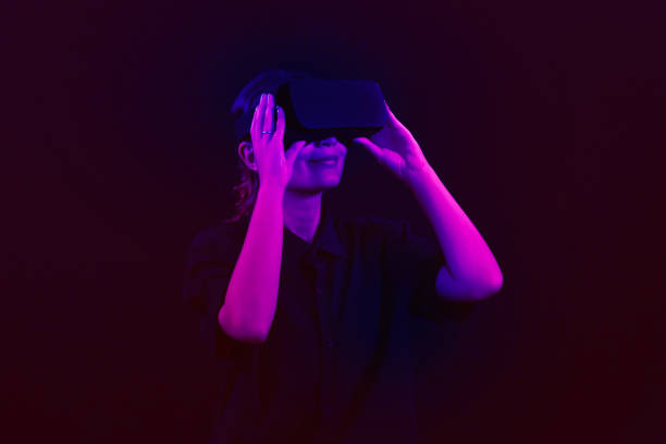 istock Meta wear VR headset connecting metaverse, future cyberspace community technology. 2158154406