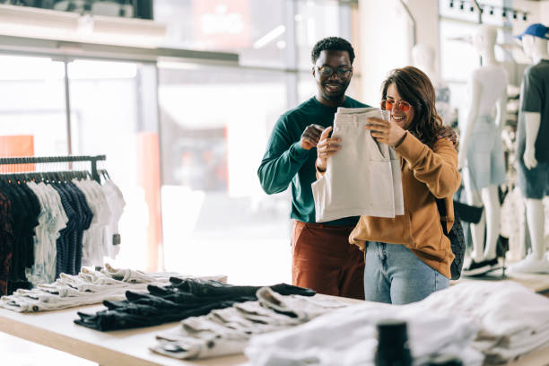 istock Couple shopping together 2158155889