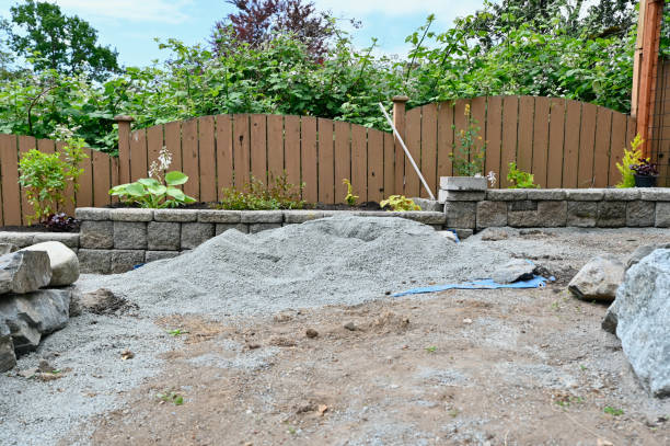 istock Rock wall construction with concrete building blocks for terracing garden, pathways, yard and patios 2158156107