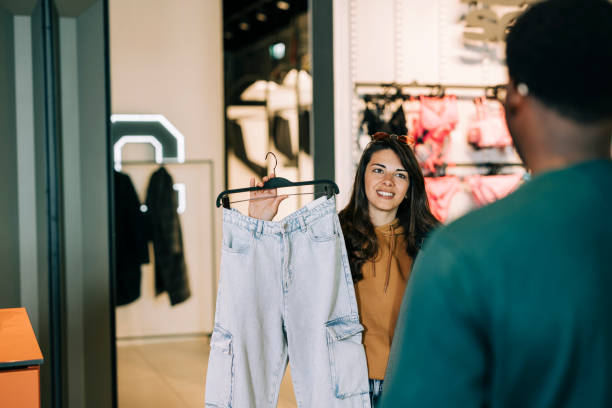 istock Couple shopping together 2158156207