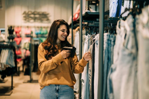 istock Small business owner smiling cheerfully in her shop. 2158156444