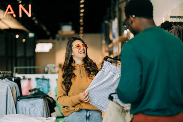 istock Couple shopping together 2158156604