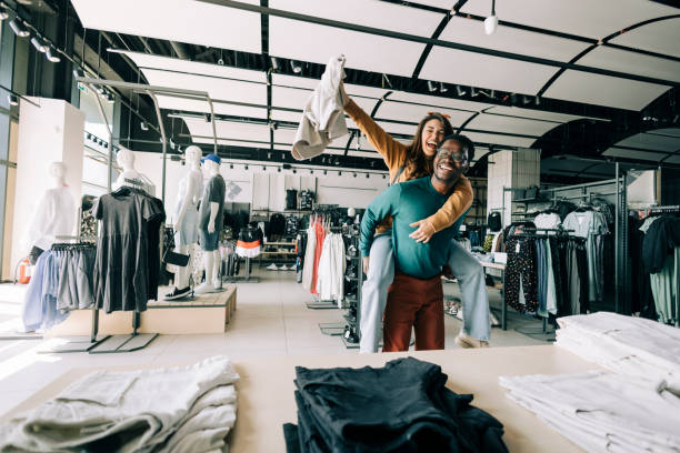 istock Couple shopping together 2158156823