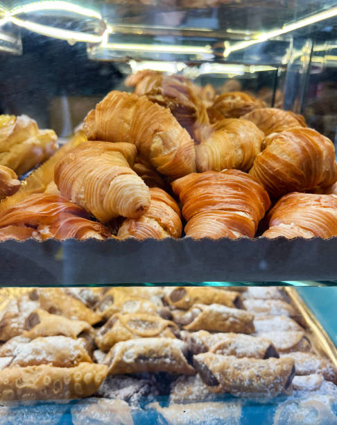 istock Cannoli stuffed with  pistachio cream in a bakery 2158157453