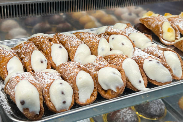 istock Typical Italian dessert Cannoli from Sicily in a Bakery 2158159854