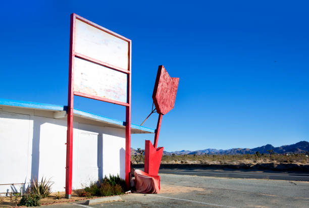 istock Abandoned road sign on desert highway 2158162585