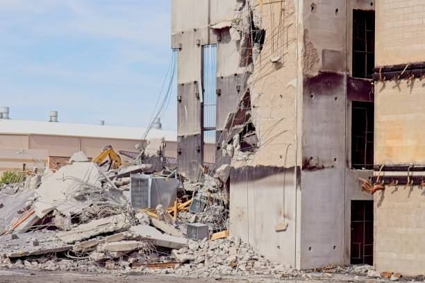 istock Building after a fire that is being demolished. 2158162694