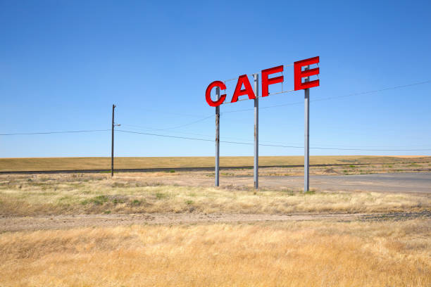 istock Road sign on desert highway 2158162716
