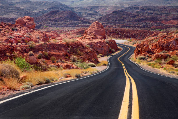 istock Aerial view of highway in desert 2158162826