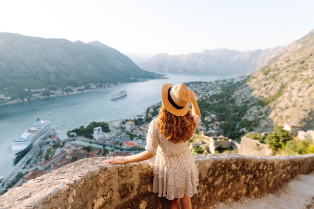 istock Tourist woman  standing on the observation deck 2158164178