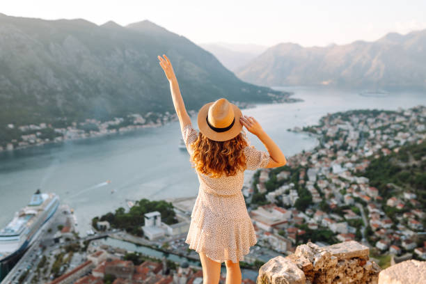 istock Tourist woman  standing on the observation deck 2158164220
