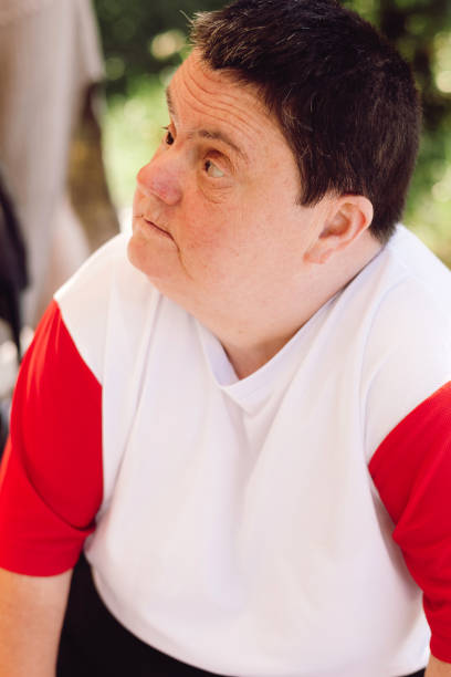 istock Woman with down syndrome smiling 2158164928