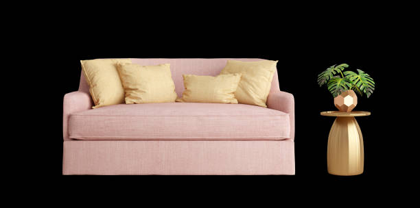 Close-Up Of Pink Sofa Against Colored Background