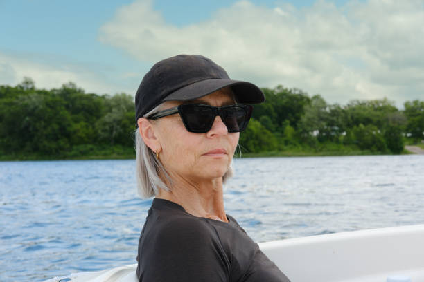 Senior woman relaxing on a boat ride