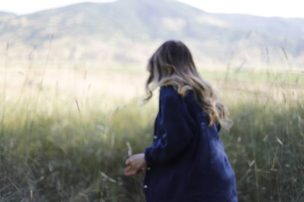 istock young girl doing activity in nature 2158171231