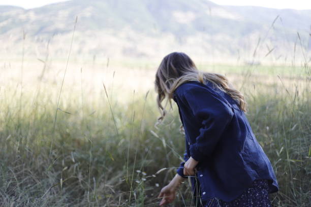 istock young girl doing activity in nature 2158171252