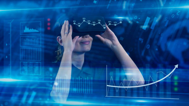 istock Business People, Employee wearing VR glasses and working on virtual holographic computer screen. Launching high-technological startup, Young engineer wearing vr headset. Technology concept. 2158171275