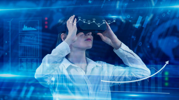 istock Business People, Employee wearing VR glasses and working on virtual holographic computer screen. Launching high-technological startup, Young engineer wearing vr headset. Technology concept. 2158171296