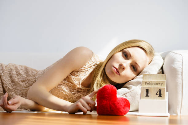 istock Sad woman on Valentines day 2158175425