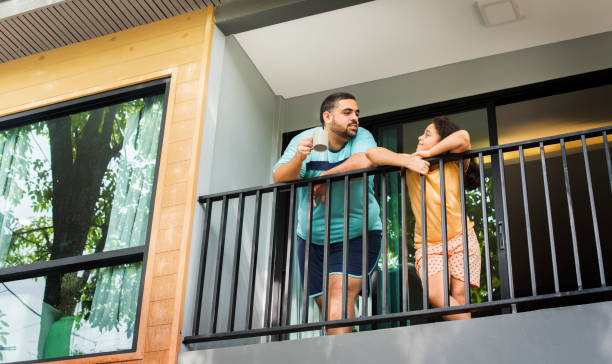 istock Father and daughter at the balcony 2158175795