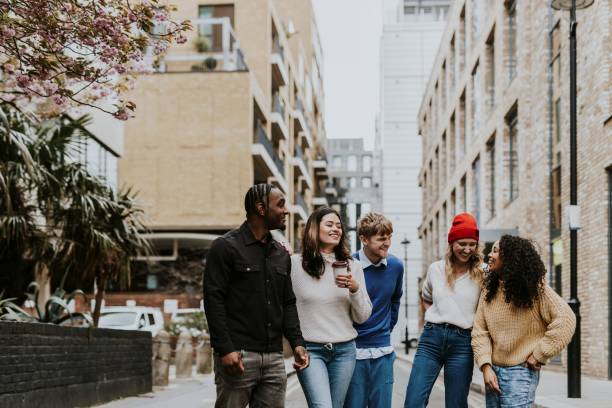 istock Diverse friends hanging out in city 2158175820