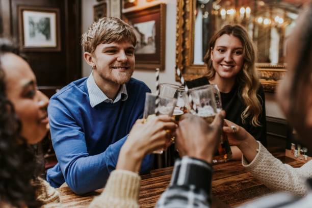 istock Diverse friends at the pub 2158176001