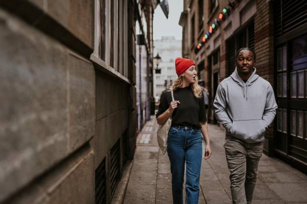 istock Couple on a date, walking in the city 2158176143