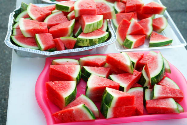 watermelon cut in pieces in the container for the event