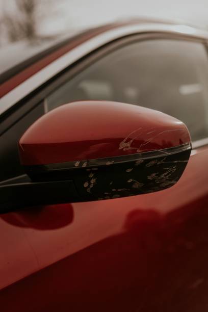 istock Dirty car side view mirror photo 2158176347