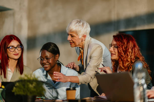 istock Interracial marketing specialists having briefing at conference room. 2158177301
