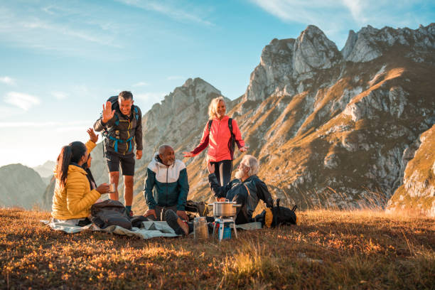 istock Diverse Group Trekking to Hilltop with Tea Break 2158179001