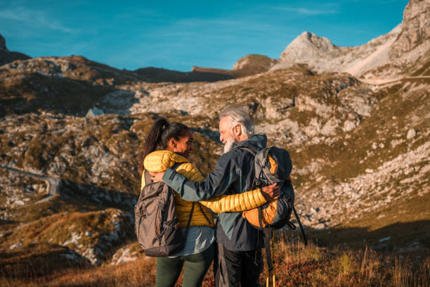 istock Diverse Mature Couple on Hill Summit 2158179005