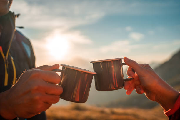 istock Hilltop Tea Trek with Mature Diverse Couple 2158179010