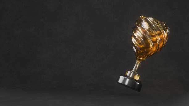 Amber winner cup on dark background. Realistic trophy awards. 3D rendering.