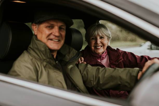 istock Senior couple sitting in car 2158183412