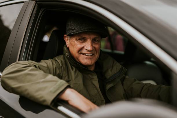 istock Senior man driving his car 2158183413