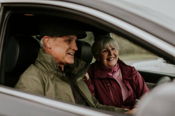 istock Senior couple sitting in car 2158183415