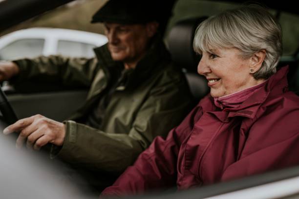 istock Senior couple sitting in car 2158183419
