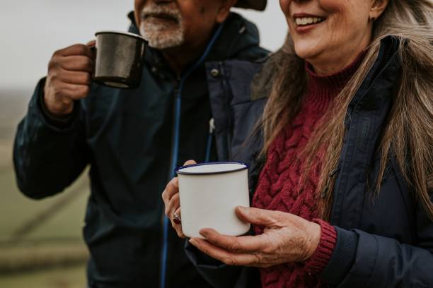 istock Senior camping couple drinking coffee 2158183496
