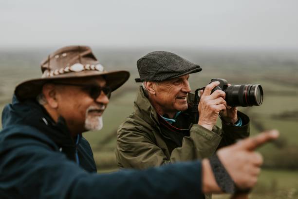 istock Senior nature photographers on mountain 2158183522