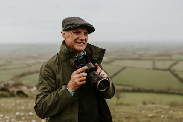 istock Senior nature photographer on mountain 2158183528