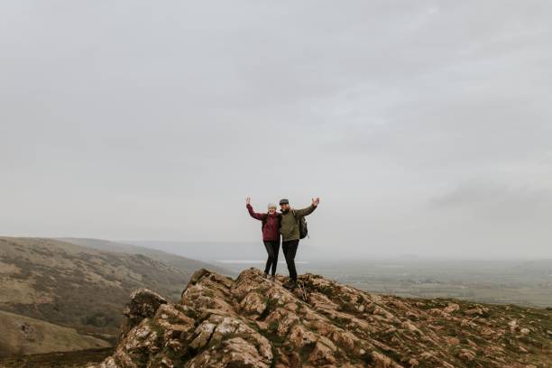 istock Happy senior couple on mountain top 2158183654