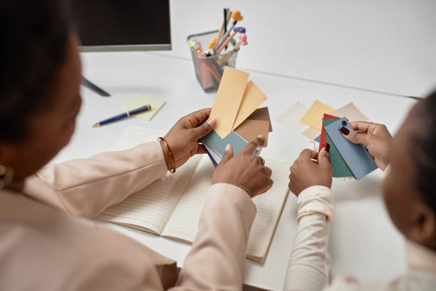 istock Two Girls Choosing Color Using Palette 2158183701