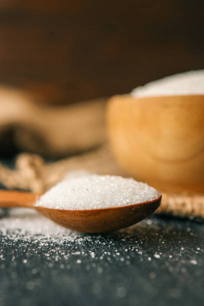 istock Sugar in a wooden bowl on burlap 2158183812