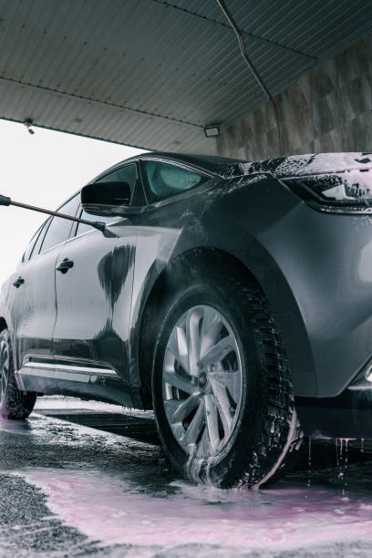 istock Hand washing car with pink foam, advertising 2158183856