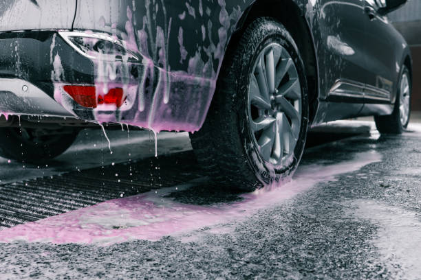 Car washing. Cleaning Car Using High Pressure Water