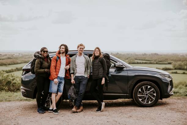 istock Friends enjoying road trip on hill photo 2158184881