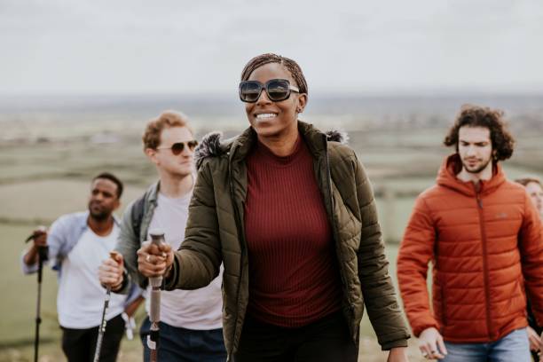 istock Friends hiking on hill, outdoor activity 2158184977